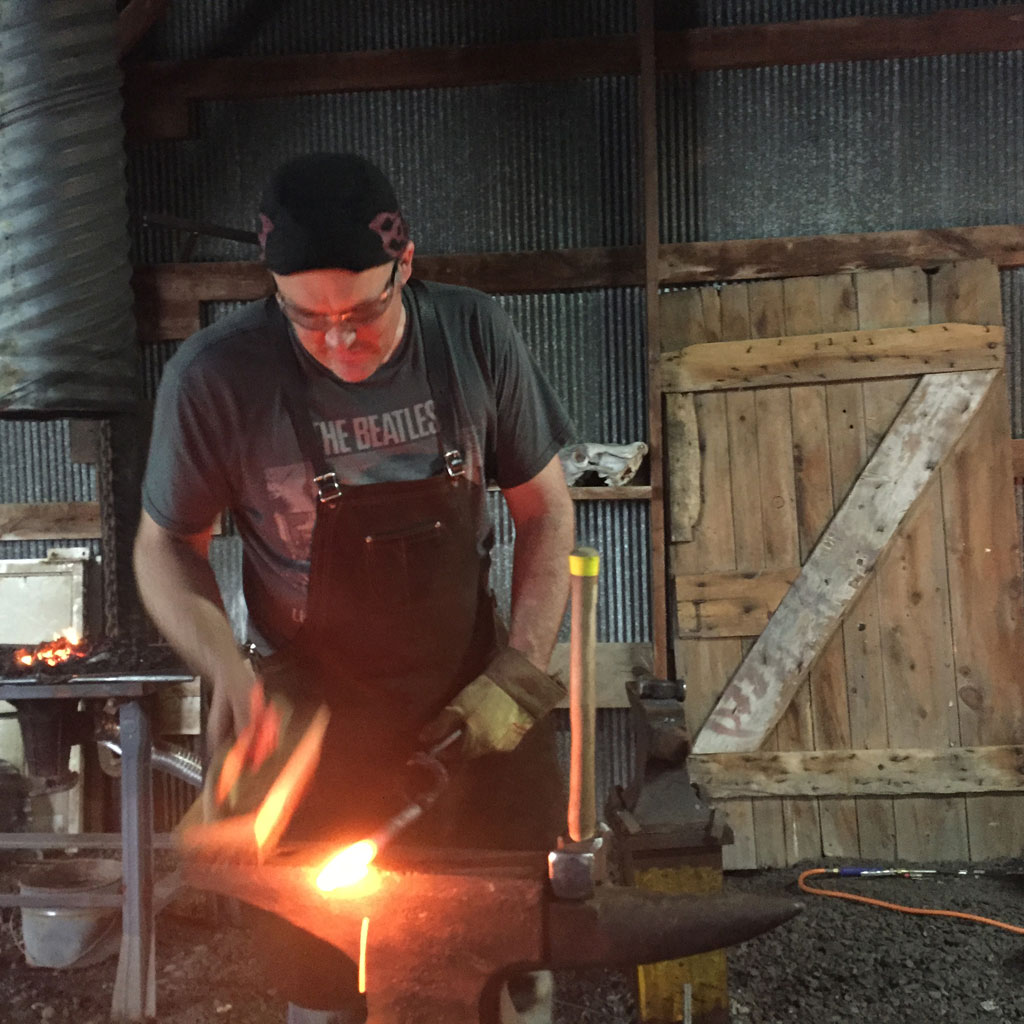 blacksmith at anvil