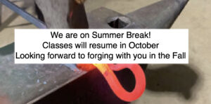 Hammer striking hot iron and caption reads 